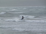 SX02957 Kitesurfer jumping from wave at Tramore beach.jpg